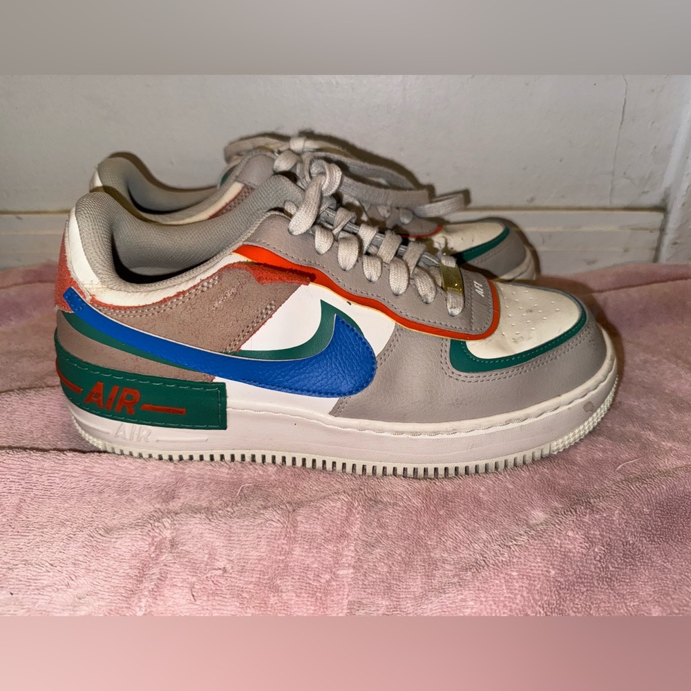 Nike Air Sneakers with Blue and Red Accents